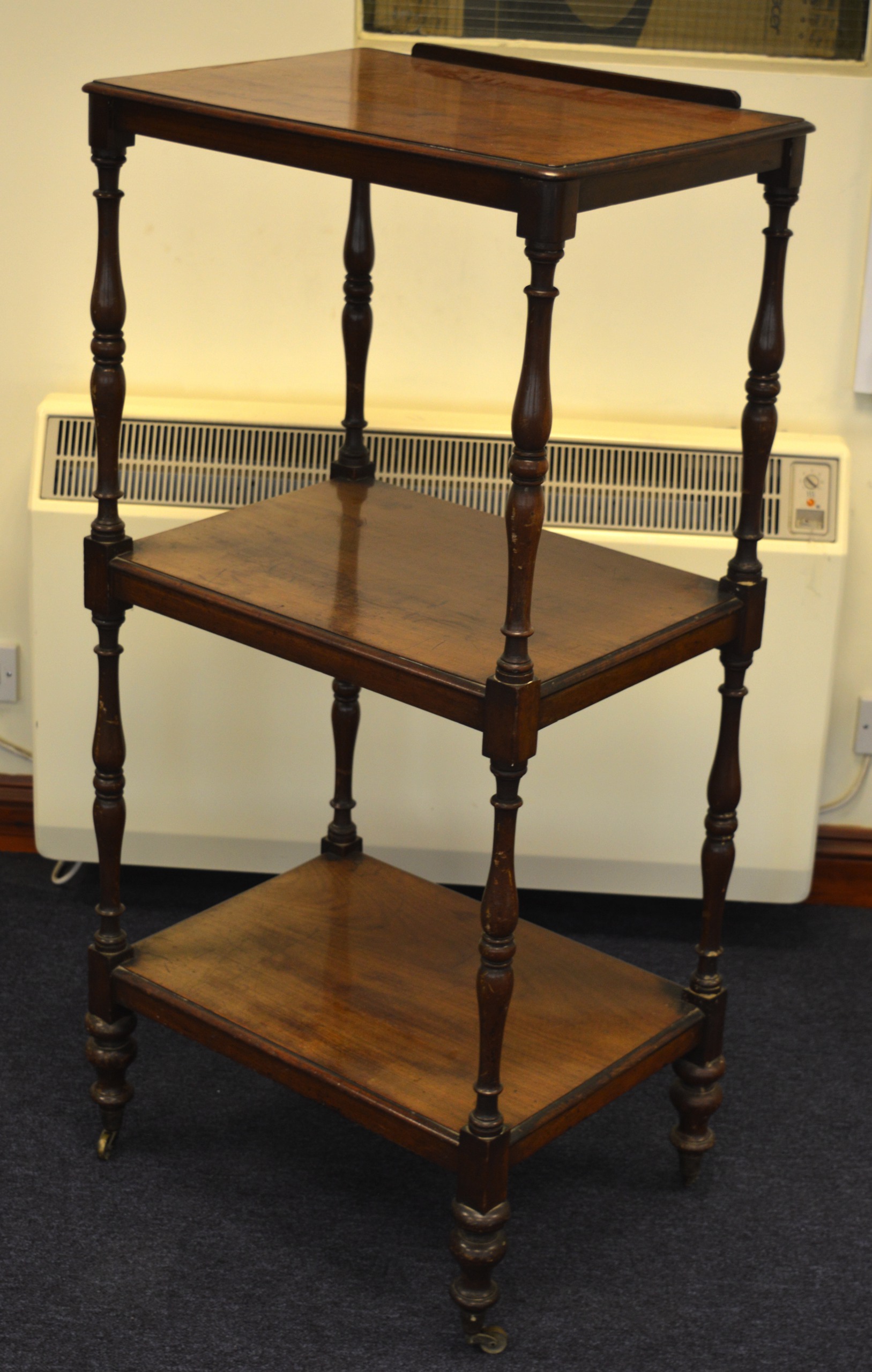 A 19TH CENTURY MAHOGANY DUMB WAITER with three tiers. 3Ft 11ins high.