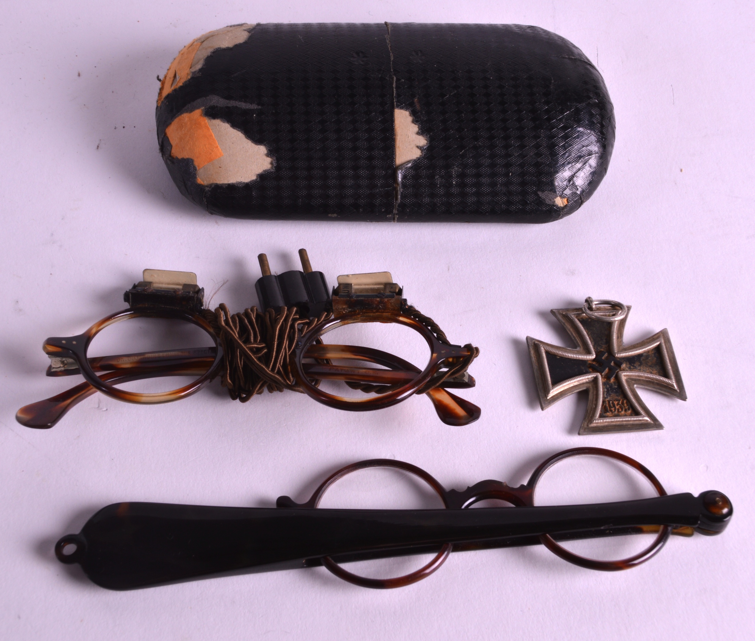 A GERMAN NAZI MEDAL together with 1930s tortoiseshell spectacles, one with lights. (3)