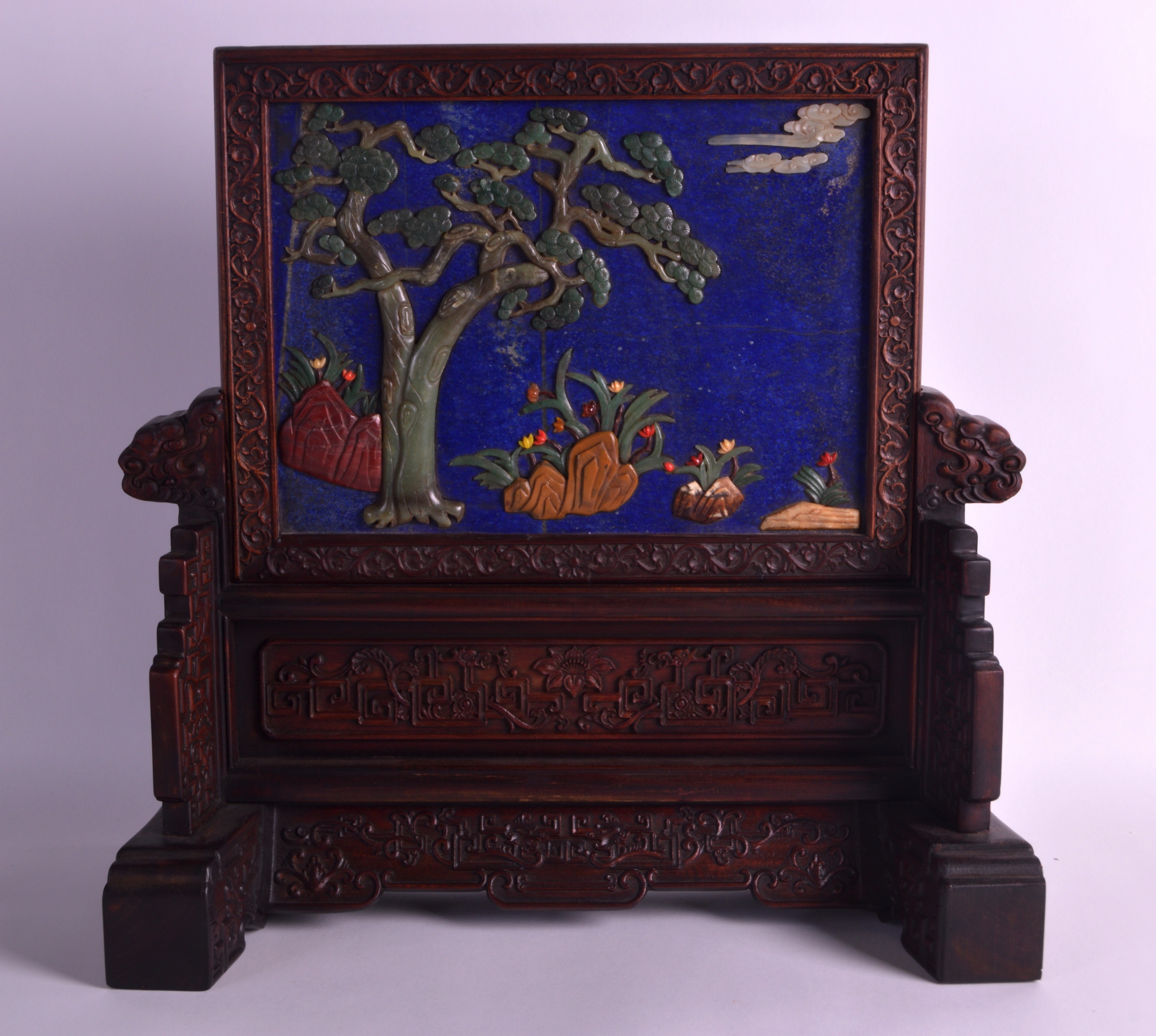 A GOOD CHINESE CARVED HARDWOOD AND HARDSTONE TABLE SCREEN ON STAND the front decorated with a