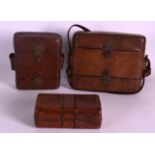 THREE VICTORIAN LEATHER CARTRIDGE CASES. (3)