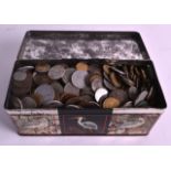 A COLLECTION OF WORLD COINAGE contained within a tin decorated with birds. (qty)