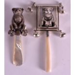 TWO NOVELTY SILVER BEAR RATTLES. (2)