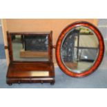 A MAHOGANY CONSOLE TABLE together with a toilet mirror. (2)