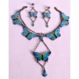 A SILVER AND ENAMEL BUTTERFLY NECKLACE together with matching earrings. (2)