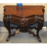 A FINE 19TH CENTURY CHINESE CARVED HARDWOOD CONSOLE TABLE well formed with dragons and lion