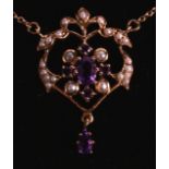 AN ANTIQUE STYLE 9CT GOLD AMETHYST AND SEED PEARL NECKLACE.