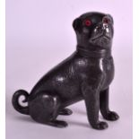 A RARE VICTORIAN PEWTER POUNCE POT/DESK SANDER in the formof a seated pug dog, with glass eyes. 4.