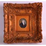 AN 18TH/19TH CENTURY ENGLISH PAINTED PORTRAIT IVORY MINIATURE painted with a gentleman wearing a