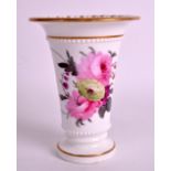 AN EARLY 19TH CENTURY ENGLISH PORCELAIN SPILL VASE Attributed to Rockingham, painted with flowers.