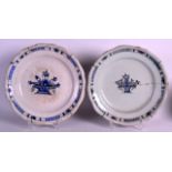 TWO 18TH CENTURY EUROPEAN DELFT TYPE TIN GLAZED CHARGERS painted with flowers. 1Ft 1ins diameter. (