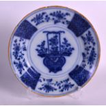 AN 18TH CENTURY DUTCH DELFT BLUE AND WHITE DISH painted with a basket of flowers. 9.25ins diameter.