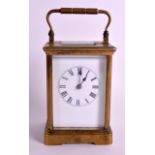 A LARGE EARLY 20TH CENTURY FRENCH CARRIAGE CLOCK TIME PIECE presented to Mr Harry Taylor, from his