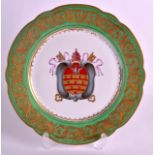 A 19TH CENTURY PARIS PORCELAIN ARMORIAL PLATE painted under an apple green and gilt border. 9.