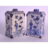 A PAIR OF 19TH CENTURY DUTCH BLUE AND WHITE TEA CADDIES painted with figures within landscapes by