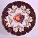 AN EARLY 20TH CENTURY ROYAL WORCESTER PLATE C1912 painted with fruit by Ricketts. 9Ins diameter.