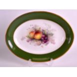 A FINE EARLY 20TH CENTURY ROYAL WORCESTER OVAL DISH painted with fruit by George Cole C1911. 10Ins