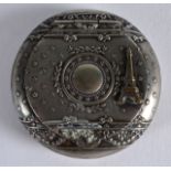 A 1920S FRENCH WHITE METAL LADIES COMPACT the top decorated with motifs and the Eiffel Tower. 2.