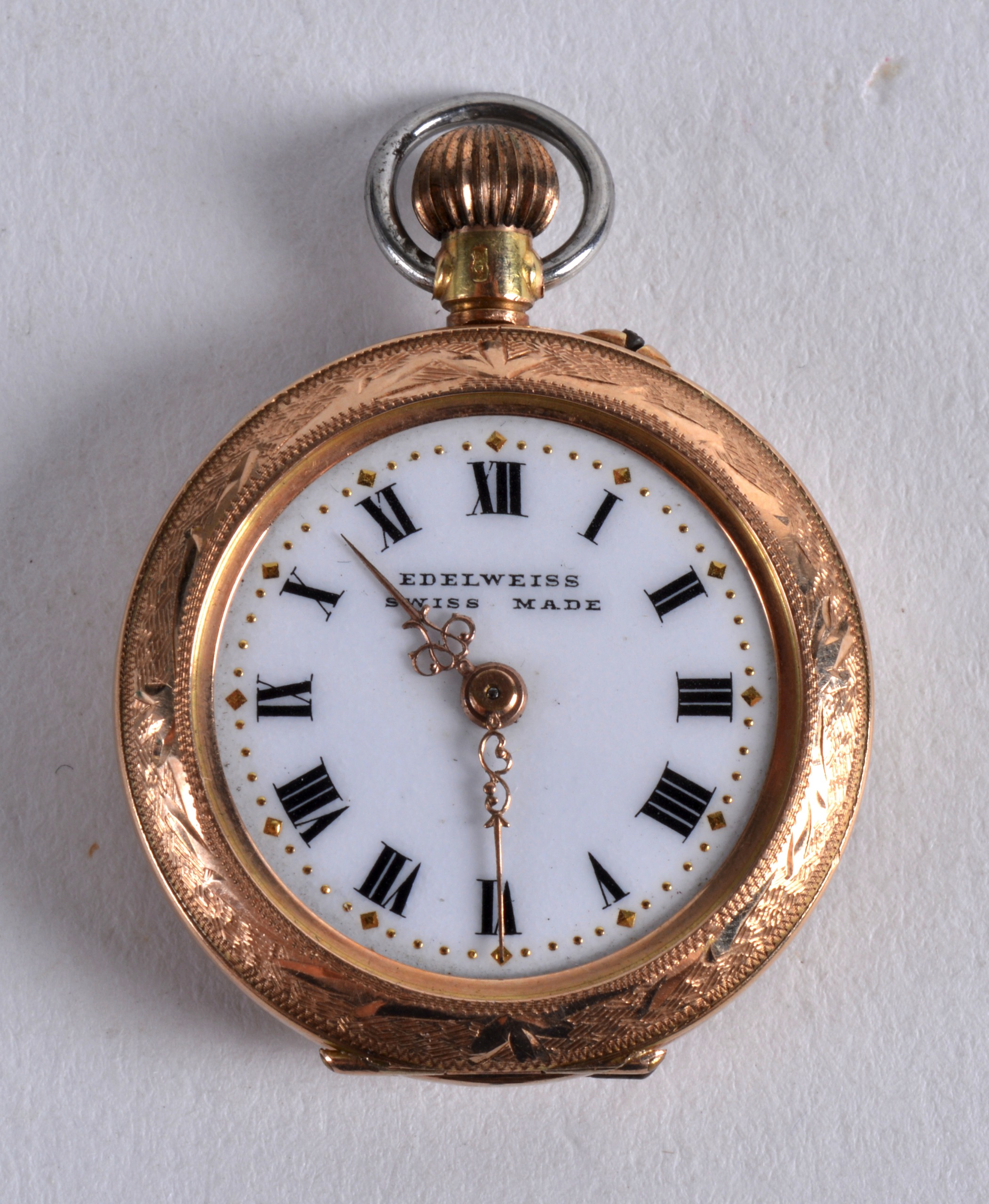 AN EDWARDIAN 9CT YELLOW GOLD AND ENAMEL FOB WATCH. 1.25ins diameter.