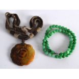 AN EARLY 20TH CENTURY CHINESE CARVED GREEN JADEITE NECKLACE together with an early 20th century rope