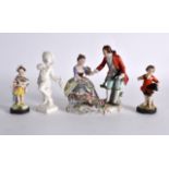 A 19TH CENTURY NYMPHENBURG PORCELAIN FIGURE OF A BOY together with three other German figures. 4.