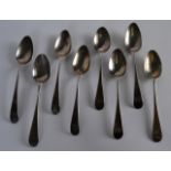 A SET OF EIGHT GEORGE III SILVER SPOONS C1790. (8)