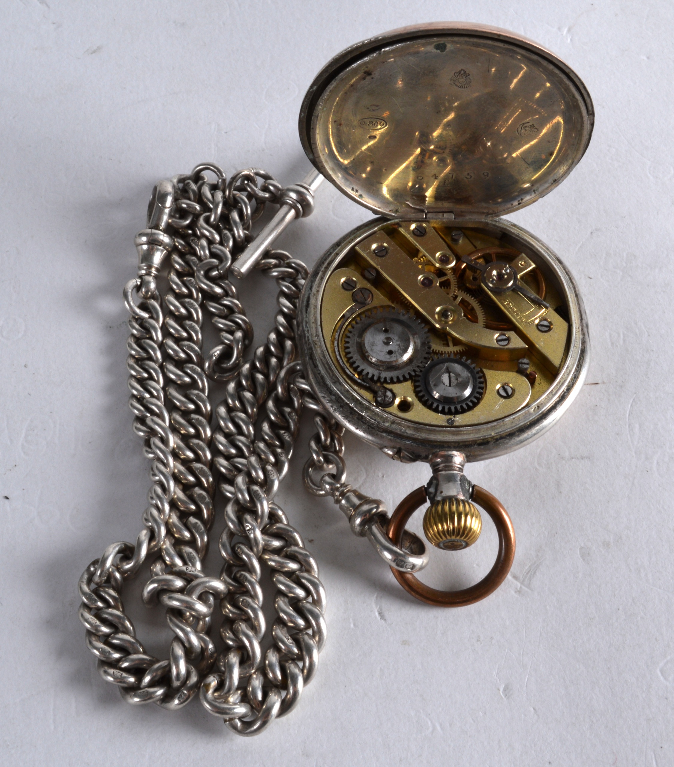 A LATE 19TH CENTURY CONTINENTAL SILVER POCKET WATCH with attached silver chain, the case decorated - Image 2 of 2