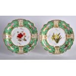 A PAIR OF 19TH CENTURY CONTINENTAL PIERCED PLATES painted with flowers under an apple green