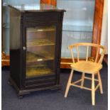 A VICTORIAN EBONISED MUSIC CABINET with glass door, together with a small vintage beech chair. (2)