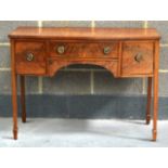 A GEORGE III MAHOGANY SERVING TABLE with single drawer flanked by two square form drawers, upon