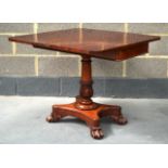 A WILLIAM IV MAHOGANY FOLD OVER TEA TABLE with foliate carved pedestal. 3Ft wide.