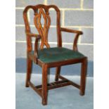 A GEORGE III SINGLE CARVER CHAIR with well carved back.