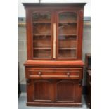 A VICTORIAN TWO DOOR MAHOGANY BOOKCASE on stand, with two cupboard doors and one drawer. 6Ft 8ins