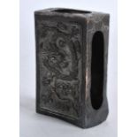 A LATE 19TH CENTURY CHINESE EXPORT WHITE METAL MATCHBOX HOLDER decorated with dragons. 2.5ins long.