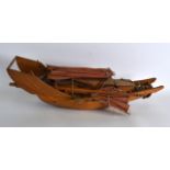 AN EARLY 20TH CENTURY CHINESE CARVED WOOD JUNK BOAT contained within its crate, purchased by a Naval