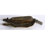 A LATE 19TH CENTURY BRONZE INKWELL in the form of a corn on the cob. 8Ins wide.