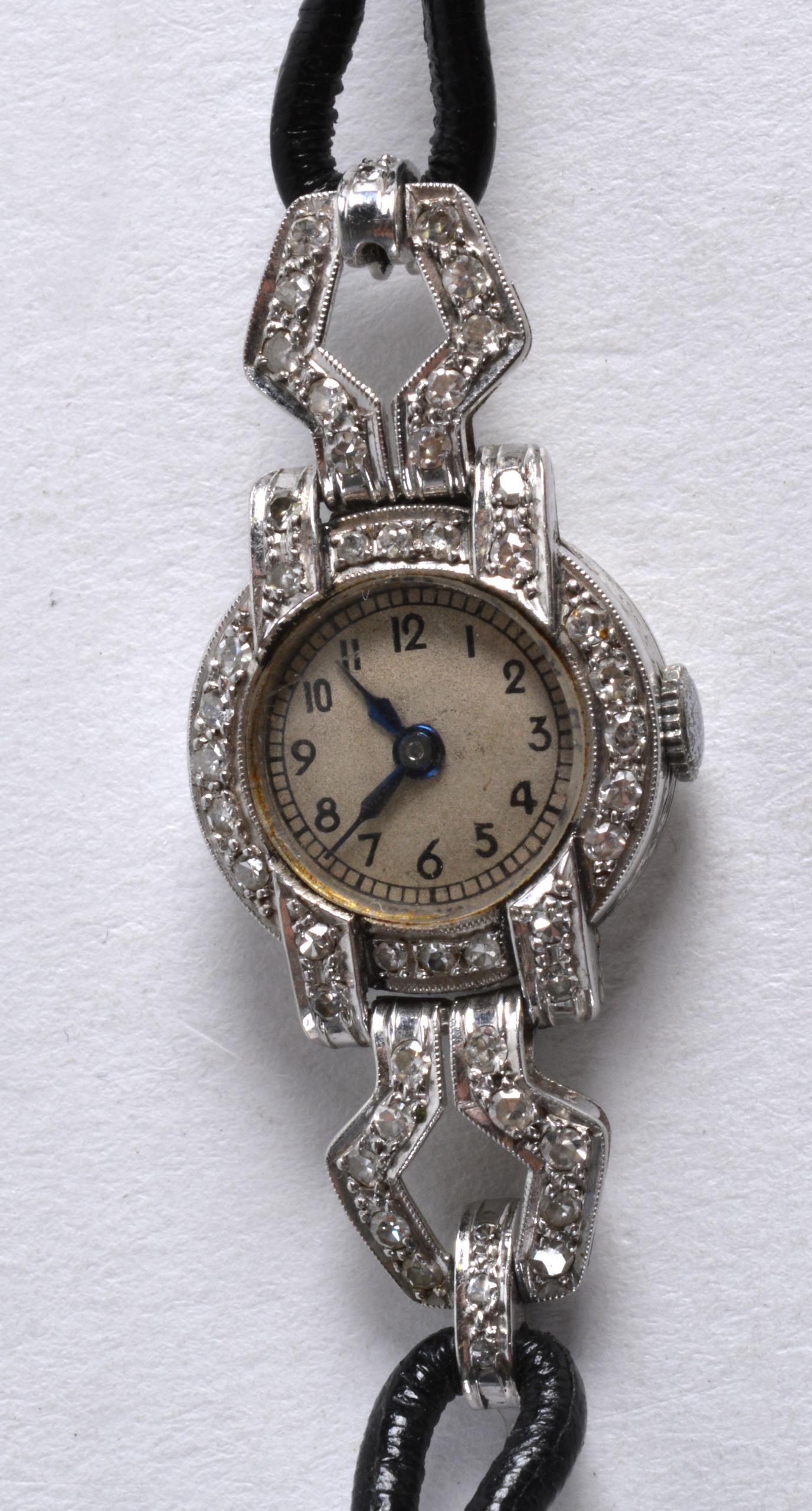 A 1930S LADIES 9CT WHITE GOLD LADIES COCKTAIL WATCH. 1.25ins long.