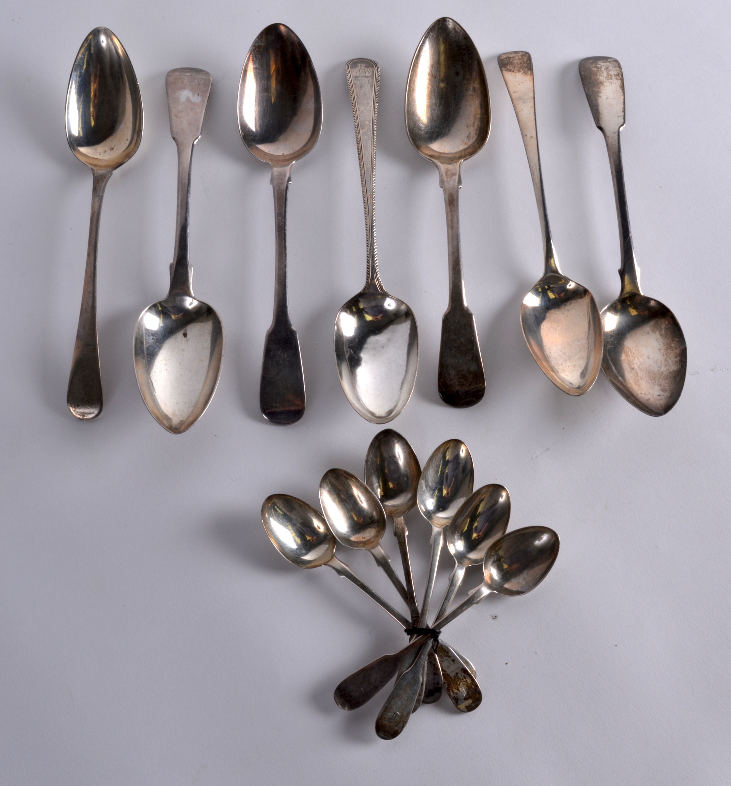 A COLLECTION OF 18TH/19TH CENTURY ENGLISH SILVER FLATWARE of various sizes, dates and manufacturers.