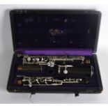 A FRENCH CASED CLARINET stamped F Loree of Paris.