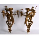 A GOOD PAIR OF 19TH CENTURY FRENCH ORMOLU TWIN BRANCH WALL SCONCES modelled as Romanesque males