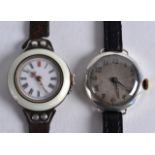 A VINTAGE ENAMELLED WRISTWATCH together with a 1930s silver wristwatch. (2)
