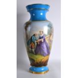 A LARGE 19TH CENTURY SEVRES PORCELAIN VASE painted with two figures within a a landscape, under a