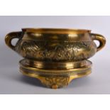 A FINE 18TH CENTURY CHINESE TWIN HANDLED BRONZE CENSER ON STAND bearing Xuande marks to base,