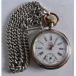 A LATE 19TH CENTURY CONTINENTAL SILVER POCKET WATCH with attached silver chain, the case decorated