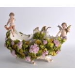 A 19TH CENTURY GERMAN TWIN HANDLED PORCELAIN BOWL encrusted all over with flowers, the sides