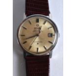 A 1970S OMEGA AUTOMATIC CHRONOMETER CONSTELLATION WRISTWATCH with red leather strap. 1.25ins