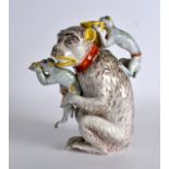 A RARE 19TH CENTURY ITALIAN FAIENCE GLAZED POTTERY TEAPOT in the form of a seated monkey, with