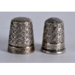 A SMALL SILVER THIMBLE by Charles Horner, together with another silver thimble. (2)