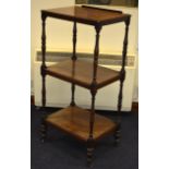 A 19TH CENTURY MAHOGANY DUMB WAITER with three tiers. 3Ft 11ins high.