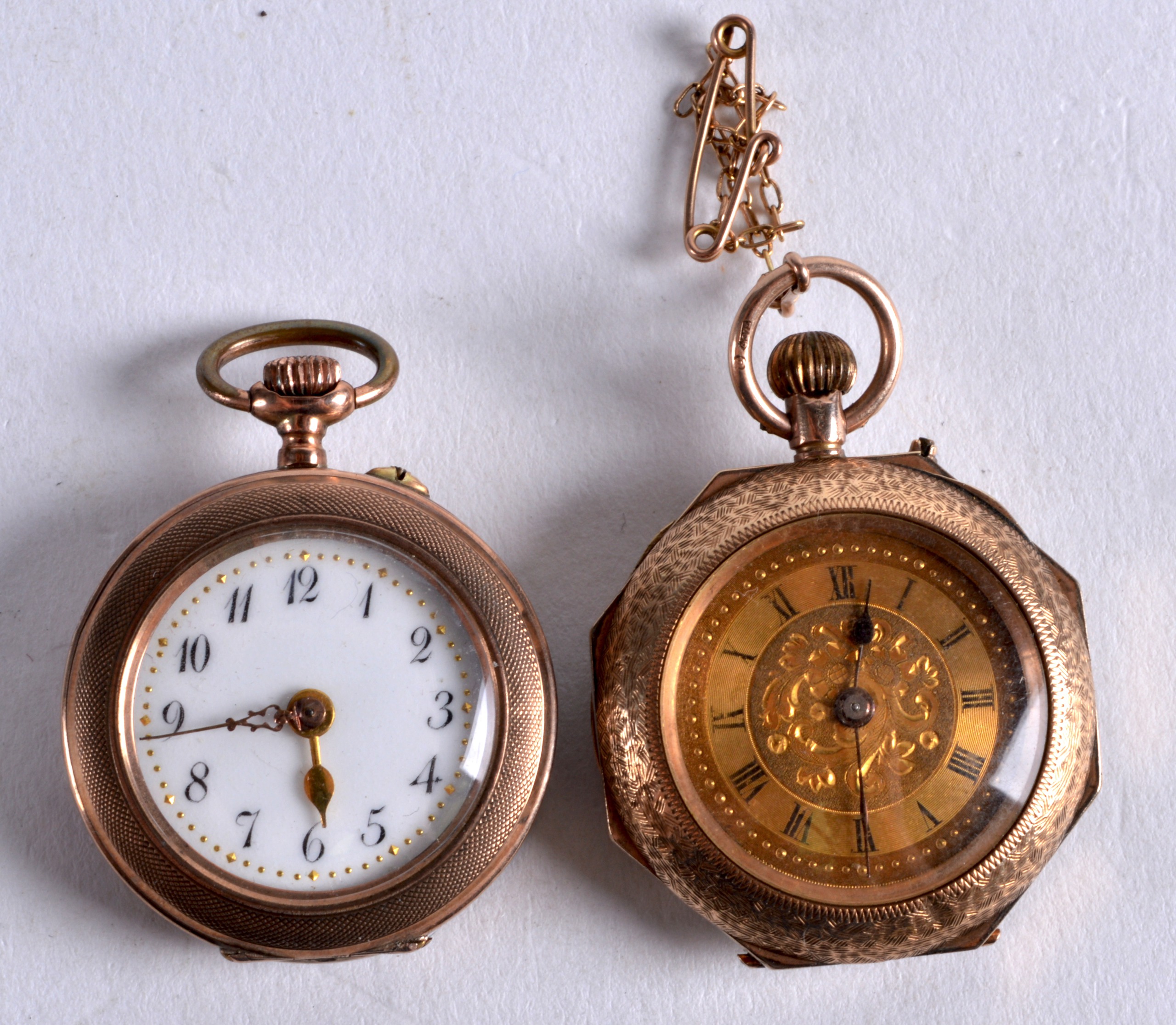 TWO EDWARDIAN 9CT YELLOW GOLD AND ENAMEL LADIES FOB WATCHES. (2)