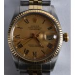 A GOOD ROLEX OYSTER PERPETUAL GENTLEMANS STEEL AND YELLOW GOLD WRISTWATCH. 1.5ins wide.